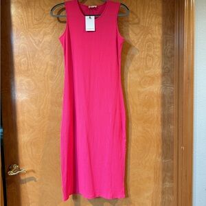 Hot pink tube dress! Follows your curves